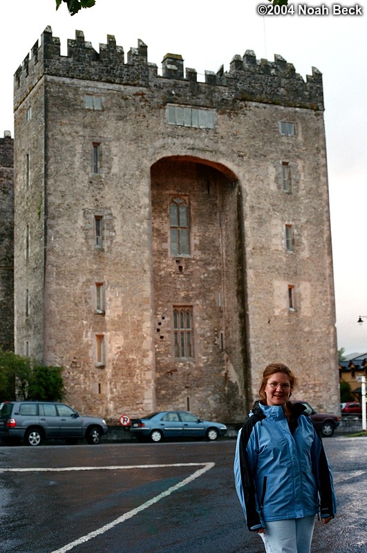 July 2, 2004: After arriving at the Shannon airport, we obtained our rental car and located a bed and breakfast in Bunratty with an available bed. We found a place to eat dinner across the street from the Bunratty Castle, shown here with Roz.