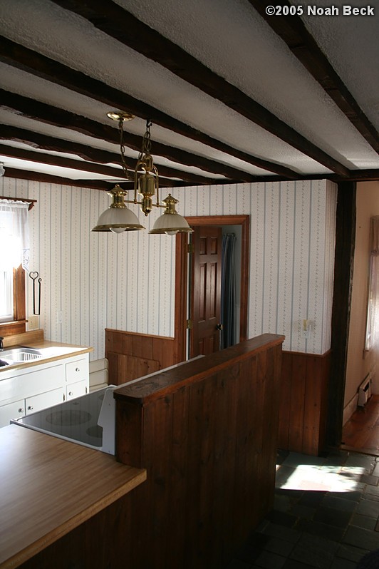 November 1, 2005: The back of the kitchen island.  The door in the center of the picture leads to a bathroom, and the opening on the right leads to the dining room.