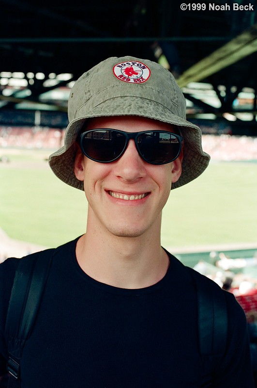 September 2, 1999: My brother modeling the free Red Sox hat he got for offering his soul to a credit card company.