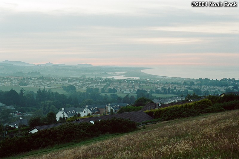 July 6, 2004: I climbed up the hill behind our B&amp;B around dusk (about 10 pm) and took this picture of the town of Wicklow.