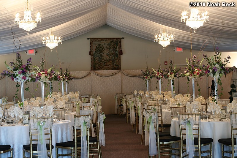 June 26, 2010: Elevated floral centerpieces with tables set