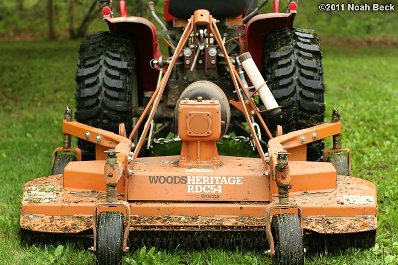 May 15, 2011: finish mower on the back of the tractor with new tires