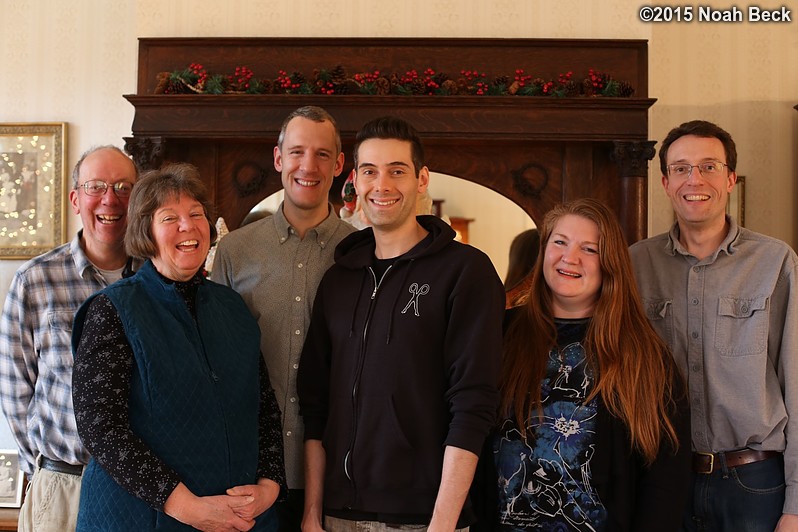 December 28, 2015: In front of the dining room mantle.  Jim, Raelynn, Gabriel, David, Rosalind, Noah