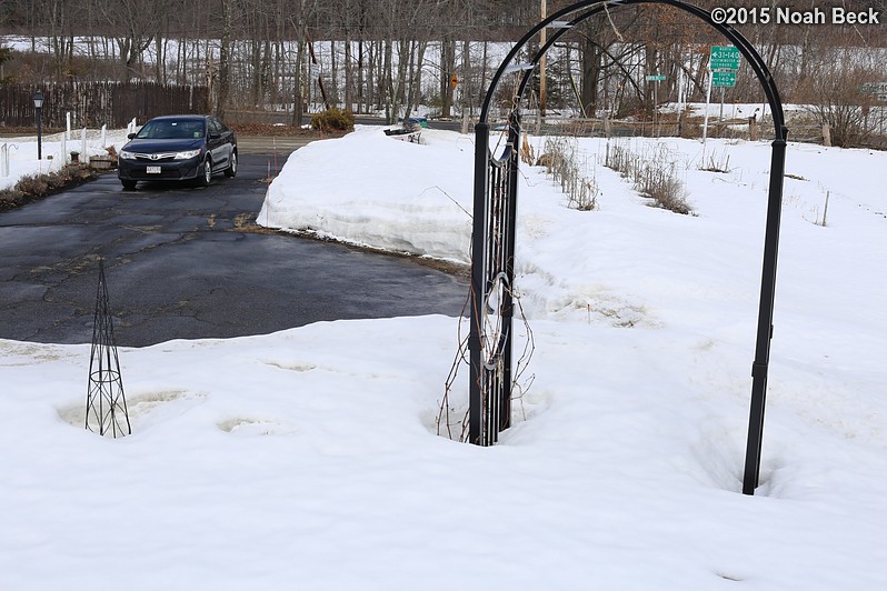 March 21, 2015: Looking down on the front driveway and garden arch after four weeks of no new snow