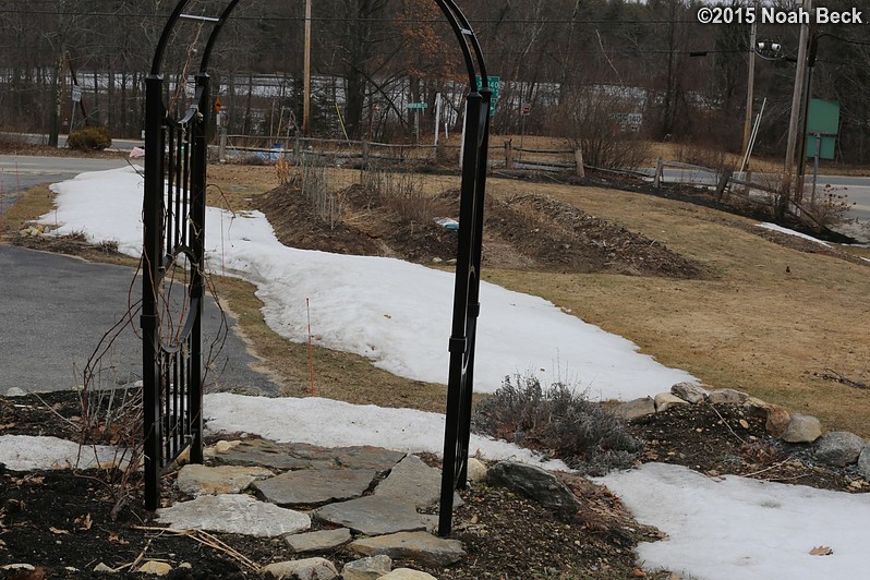 April 5, 2015: Looking down on the front driveway and garden arch after six weeks of no new snow