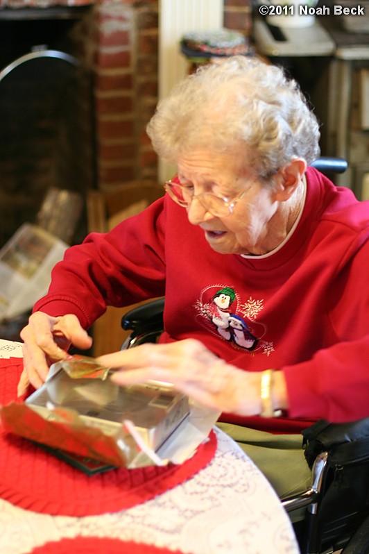 December 25, 2011: Grandma opening presents Christmas morning