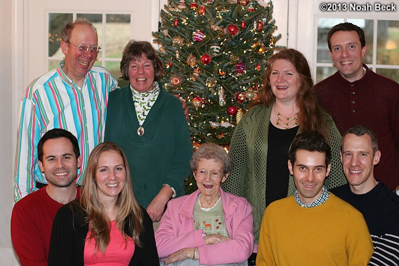 December 25, 2013: Group photo in front of the Christmas tree.  Back: Jim, Raelynn, Rosalind, Noah; Front: Mike, Anna, Lucile, David, Gabriel