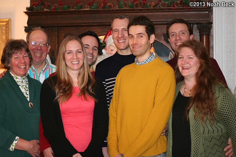 December 25, 2013: Group photo in front of the mantle.  Left to right: Raelynn, Jim, Anna, Mike, Gabriel, David, Noah, Rosalind