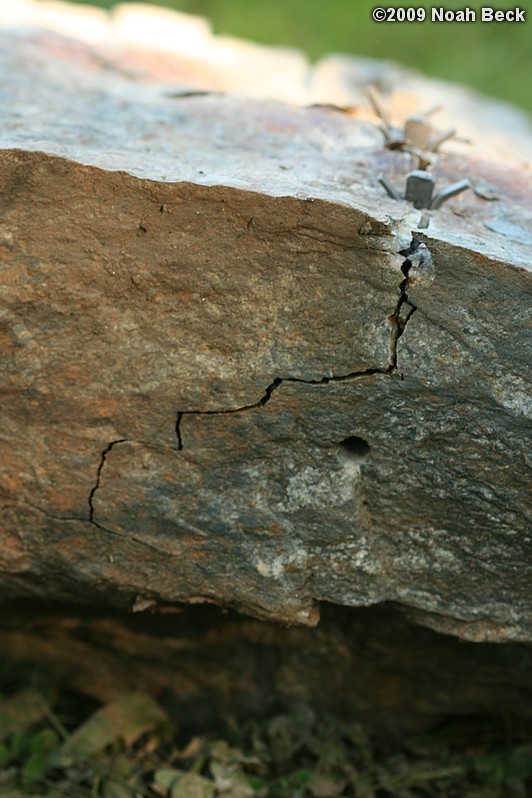 July 10, 2009: Using a hammer drill and feathers and wedges to split up rocks into rock steps