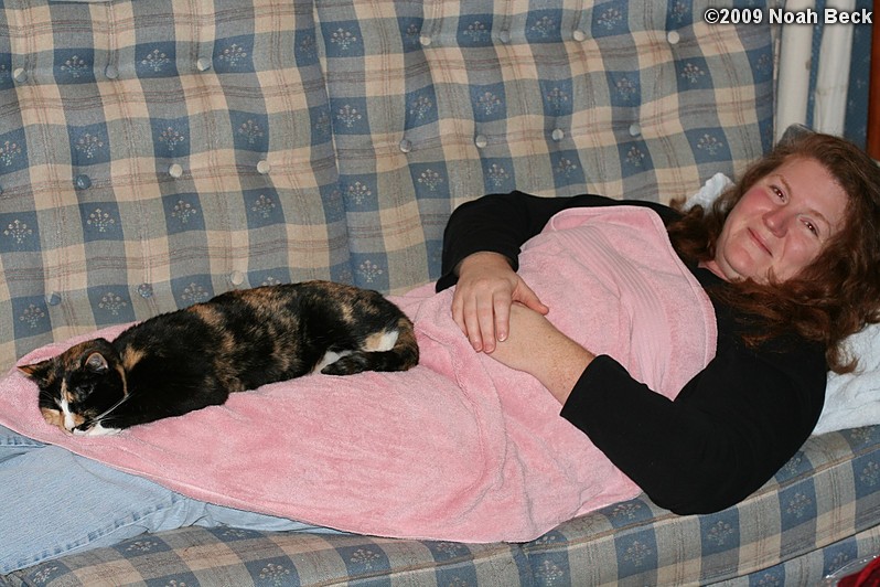 January 7, 2009: Katie napping on Roz on the couch