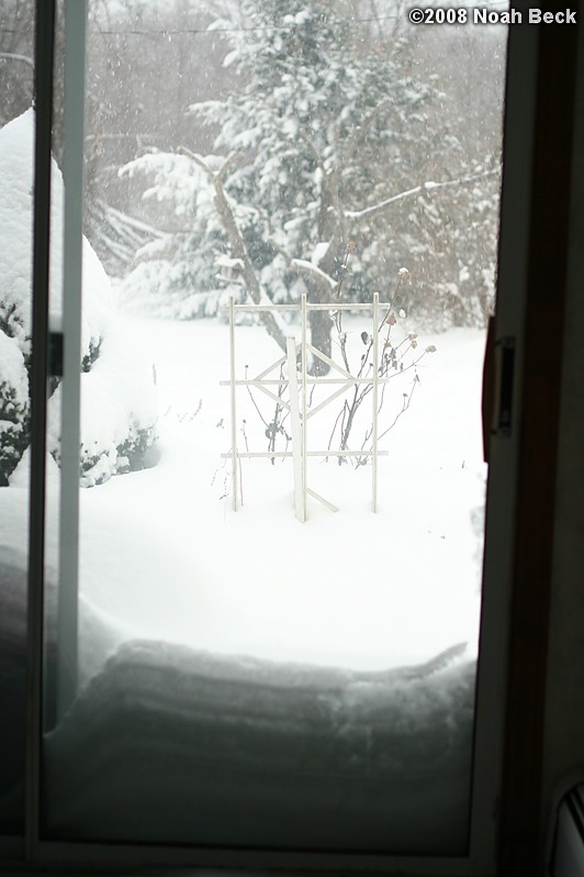 December 20, 2008: Layers of snow building up outside the bedroom sliding door on the last day without power due to the ice storm