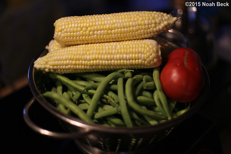 August 13, 2015: First major harvest, green beans, corn and a tomato