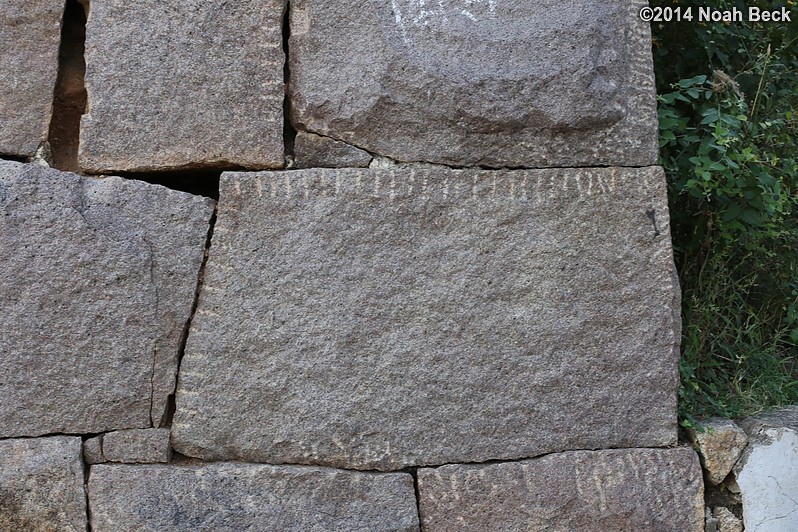 December 7, 2014: Marks from splitting the granite blocks used in construction