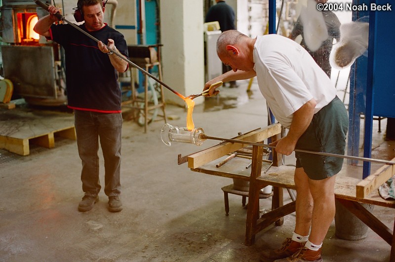 July 6, 2004: The molten crystal for the handle is applied to the side of the container.