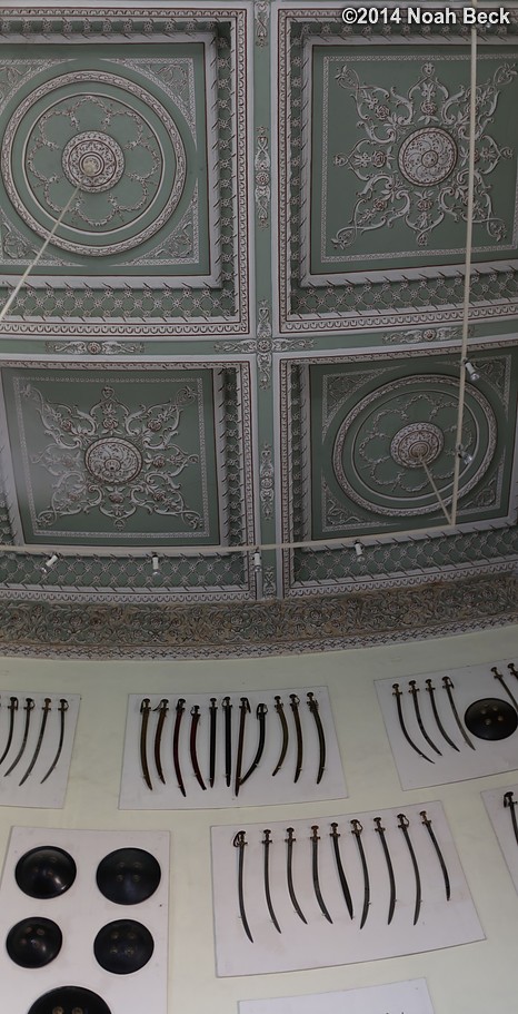 December 7, 2014: Panorama of weaponry on display with ceiling detail at Khilwat Mubarak