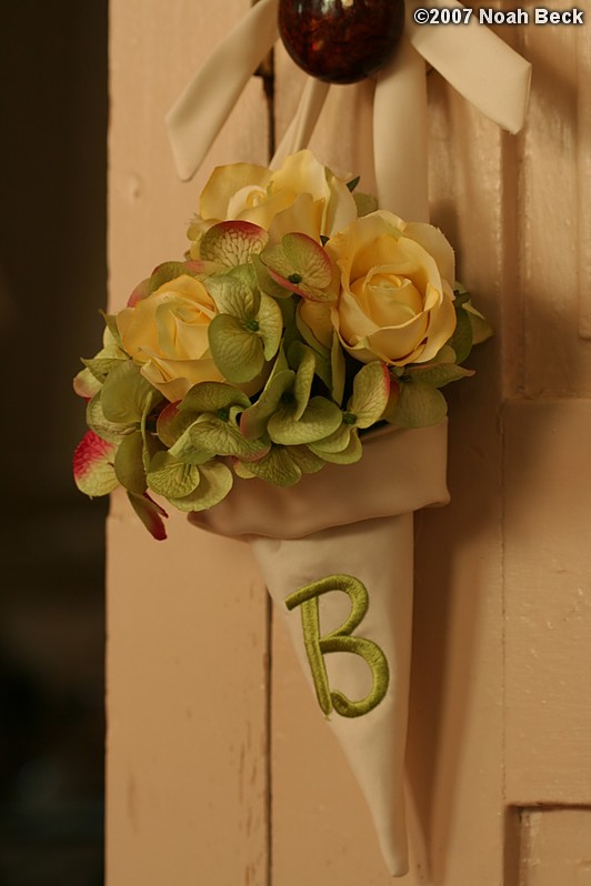 October 6, 2007: Pew cone with silk flowers