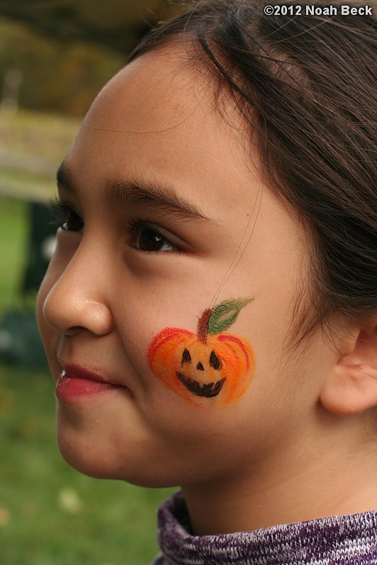 October 6, 2012: A pumpkin painted on Jaeda&#39;s cheek