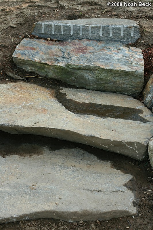 July 19, 2009: New rock steps in place at the end of the rock wall at the top of the driveway