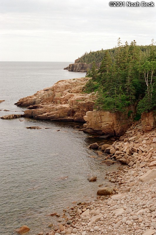 June 29, 2001: The rocky shoreline along Newport Cove. Note the pink hue of the granite; it&#39;s like this all over the island.