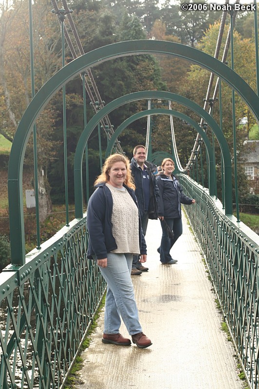 October 21, 2006: Rosalind, Iain, and Julie on a wee wobbly bridge crossing the River Tummel just downstream from the hydro-electric dam in Pitlochry.