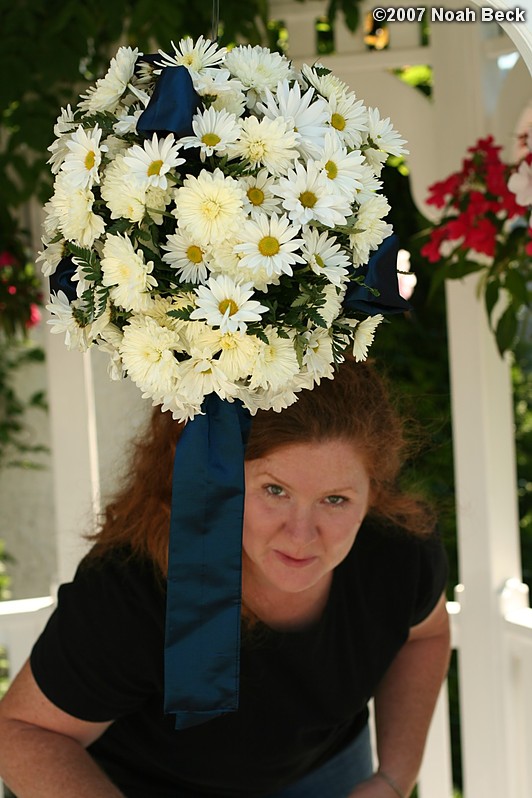 August 5, 2007: Rosalind and a pomander in a small pergola