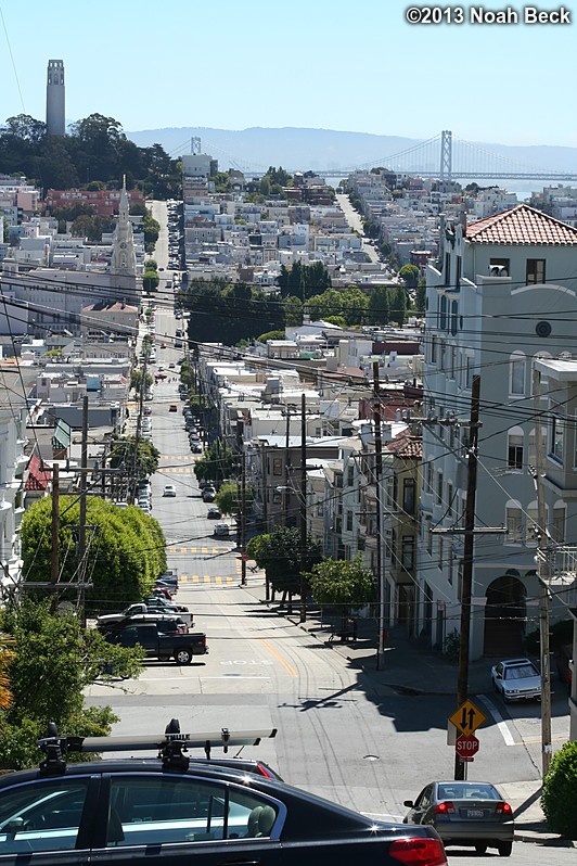 June 28, 2013: View from the top of the hill on Filbert St with the Bay Bridge and Colt Tower in the background