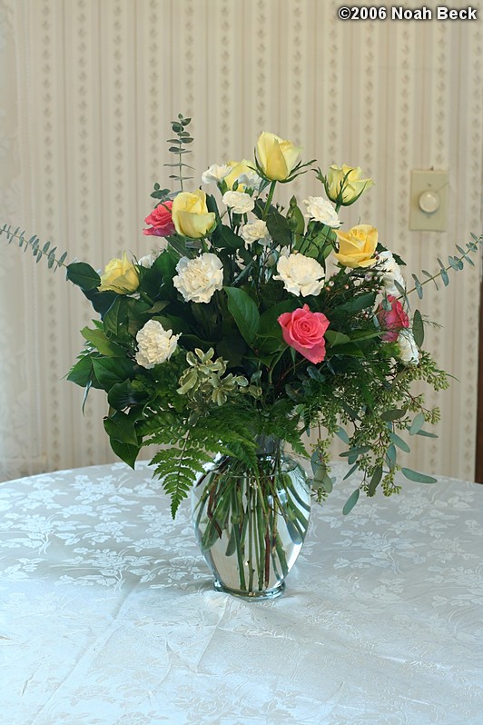 January 29, 2006: Yellow Skyline Roses, White Carnations, Eucalyptus and Seeded Eucalyptus with Pink Sweetheart Roses in a garden vase